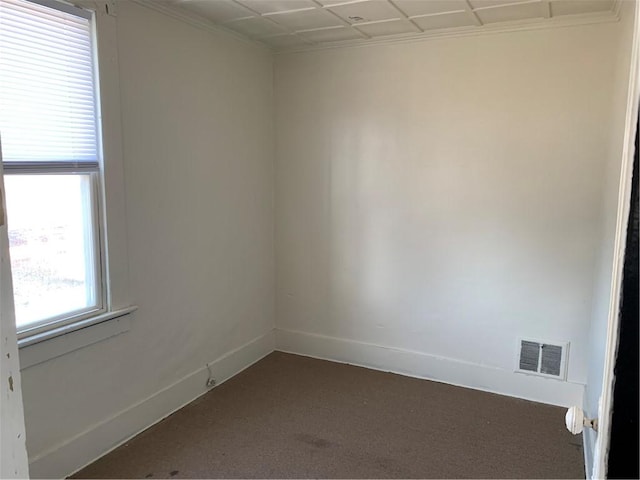 empty room featuring carpet floors