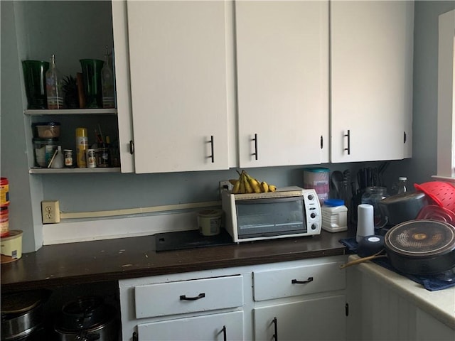 kitchen with white cabinetry