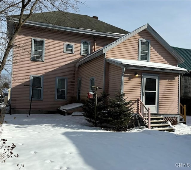 view of snow covered property