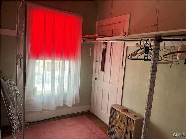 mudroom featuring a wall mounted air conditioner