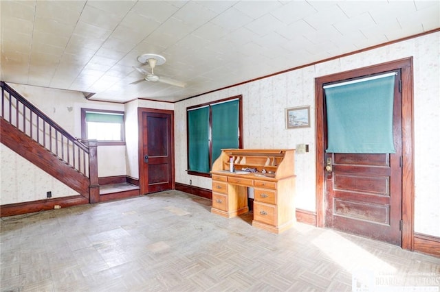 interior space featuring ceiling fan and light parquet flooring