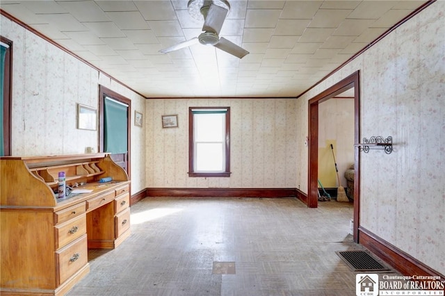 interior space featuring ornamental molding and ceiling fan