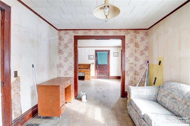 hall with ornamental molding and light parquet flooring