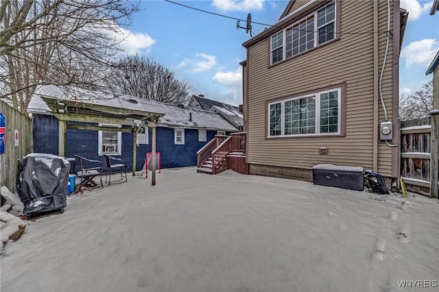 rear view of property with a patio area