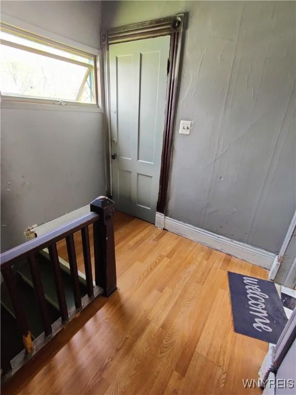 staircase featuring hardwood / wood-style floors