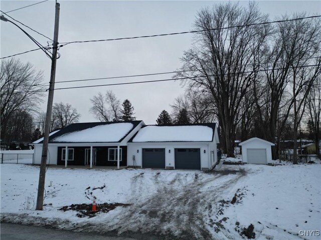 view of front of property featuring a garage