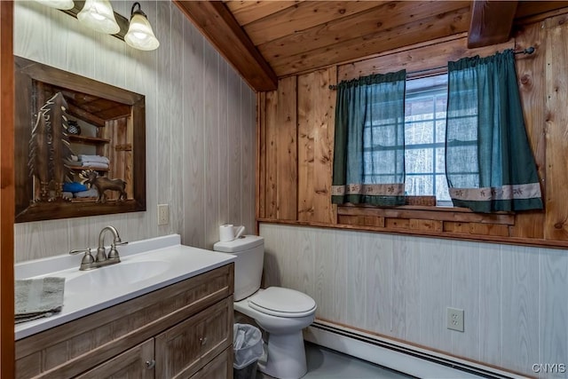 bathroom featuring a baseboard heating unit, wood ceiling, wooden walls, and toilet