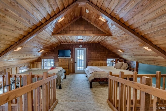 bedroom featuring wood walls, light carpet, and vaulted ceiling with beams