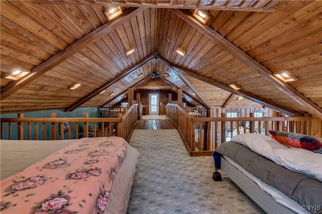 unfurnished bedroom with vaulted ceiling, light carpet, and wood ceiling