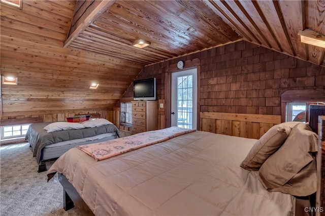 carpeted bedroom with access to outside, wood ceiling, wooden walls, and vaulted ceiling