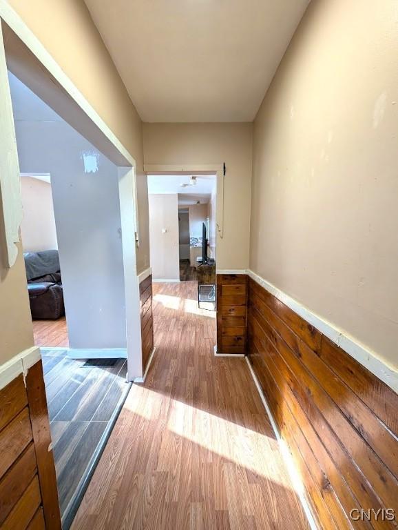 corridor featuring light hardwood / wood-style floors