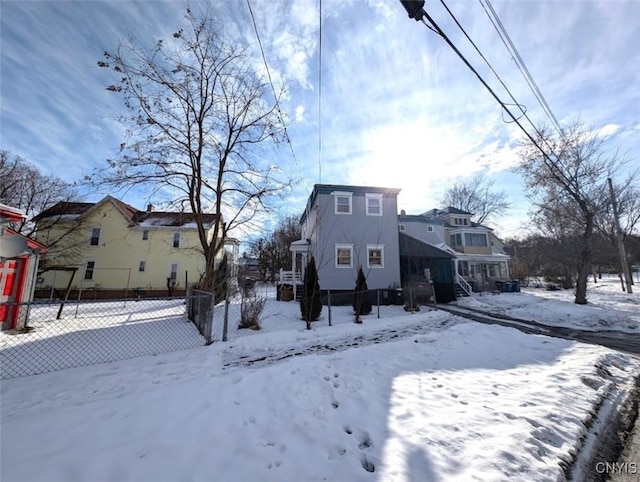 view of snow covered property