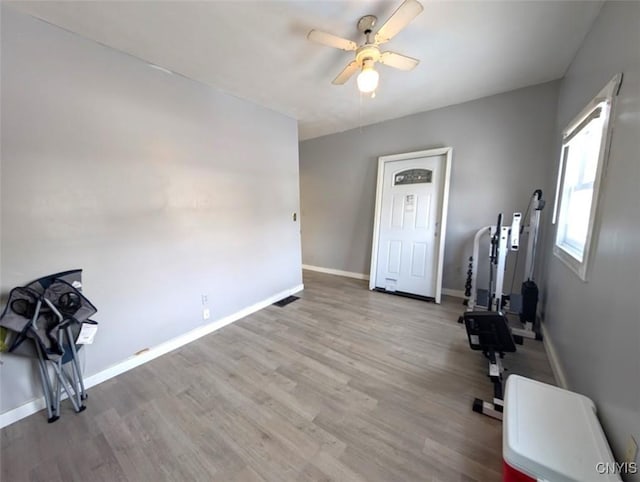 interior space with ceiling fan and light wood-type flooring