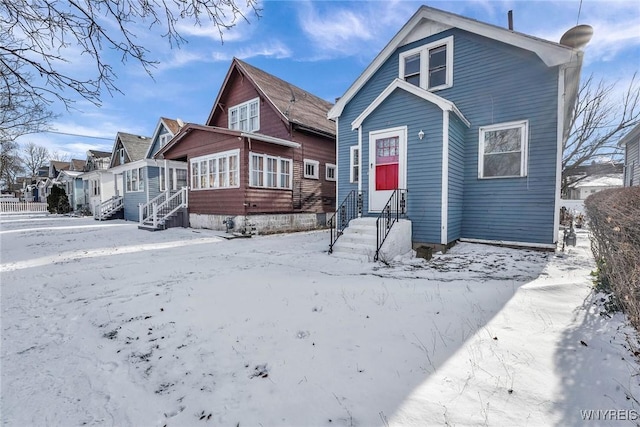 view of snow covered property