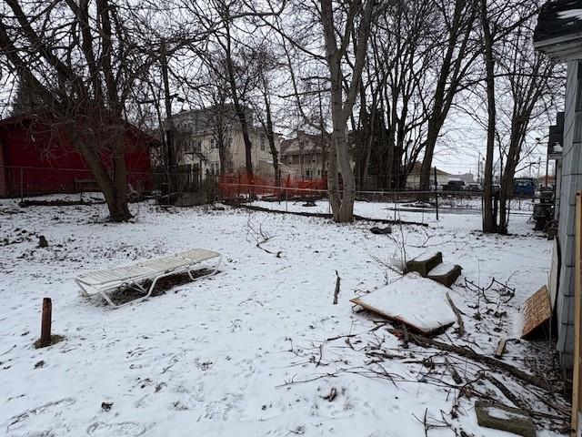 view of yard covered in snow