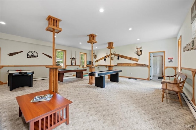 recreation room with billiards, light colored carpet, and baseboard heating