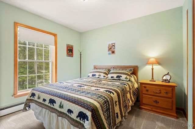 carpeted bedroom featuring a baseboard radiator