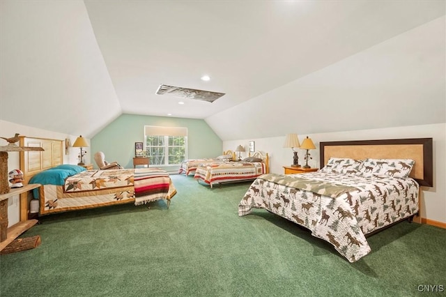 bedroom with vaulted ceiling and carpet