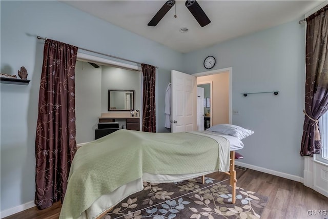 bedroom with hardwood / wood-style flooring and ceiling fan