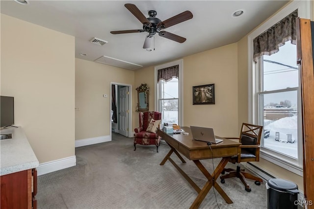 home office featuring carpet and ceiling fan