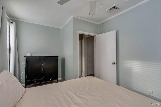 bedroom featuring crown molding and ceiling fan