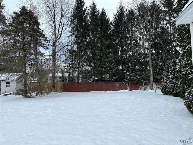 view of yard covered in snow