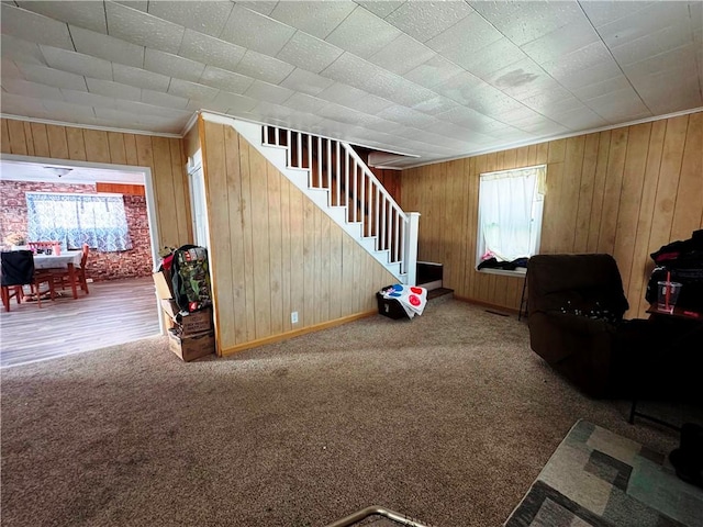 unfurnished living room featuring carpet flooring