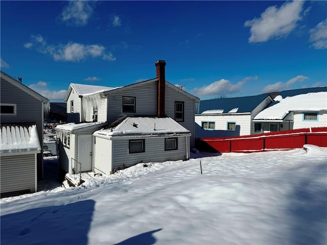 view of snow covered property