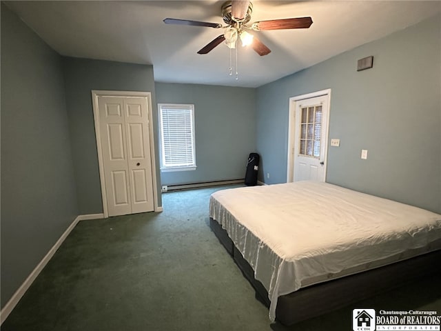 carpeted bedroom with a baseboard heating unit and ceiling fan