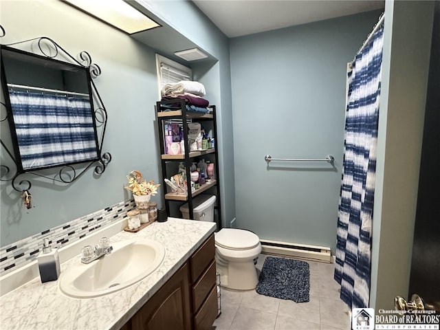 bathroom featuring baseboard heating, tile patterned flooring, vanity, decorative backsplash, and toilet