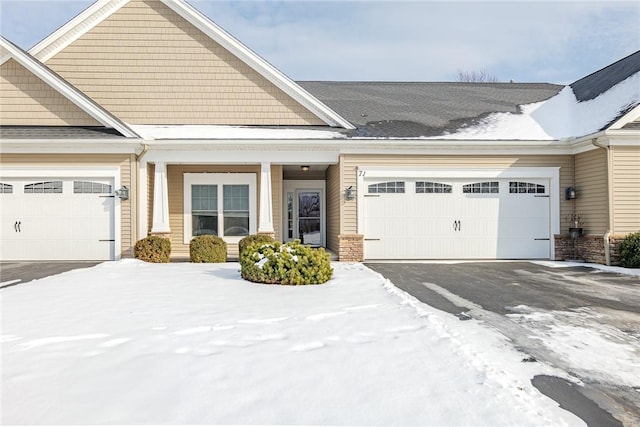 view of front of property with a garage