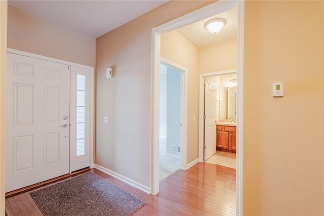 entryway with light wood-type flooring