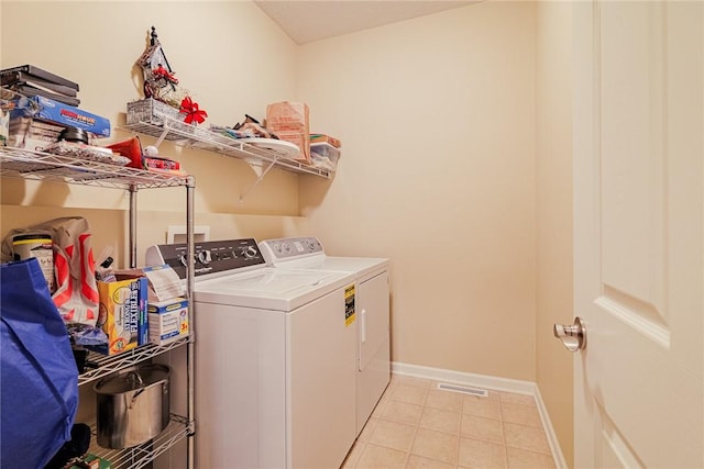 washroom with washer and dryer