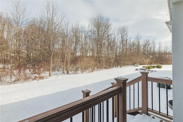 view of snow covered deck