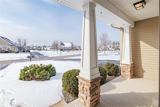 view of snow covered patio