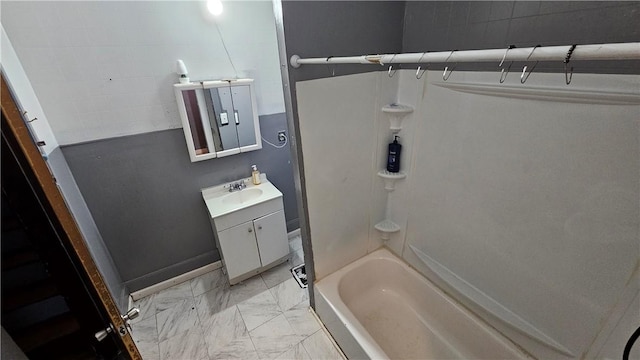 bathroom with vanity and shower / bath combination