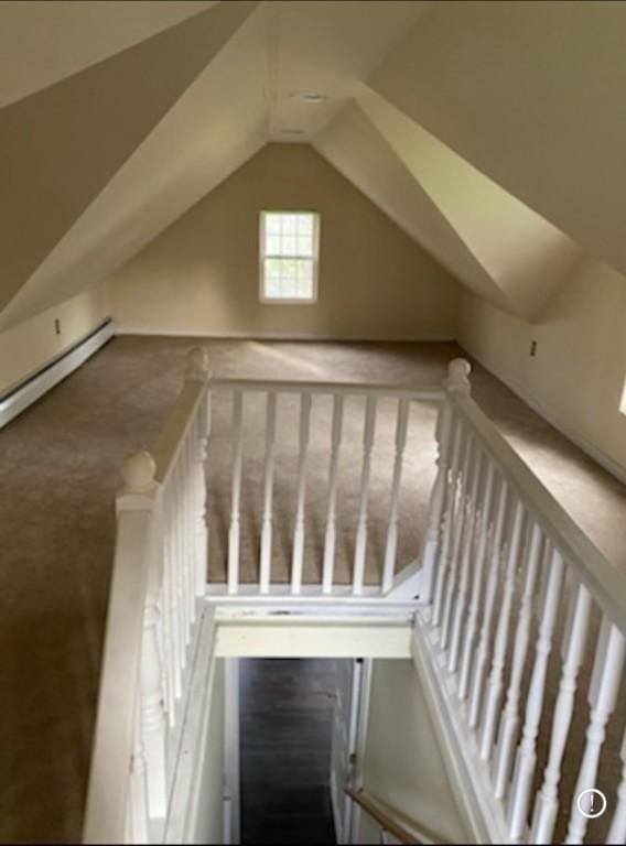 staircase with lofted ceiling