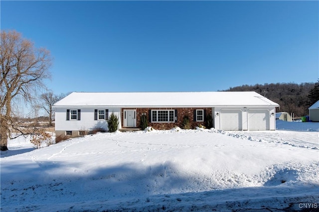 single story home featuring a garage