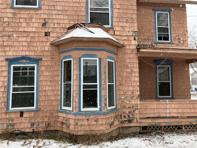 view of snow covered property