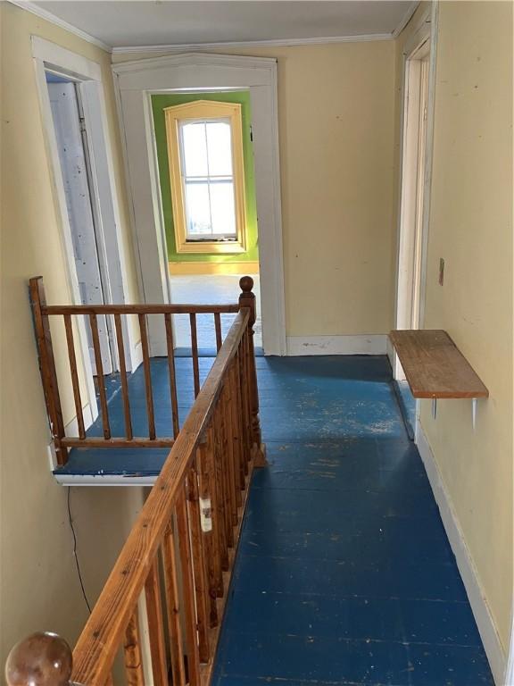 hallway with crown molding