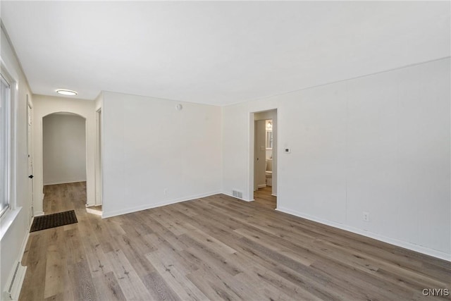 spare room featuring light wood-type flooring