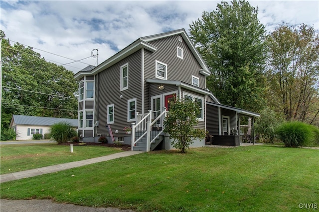 view of front of property with a front lawn