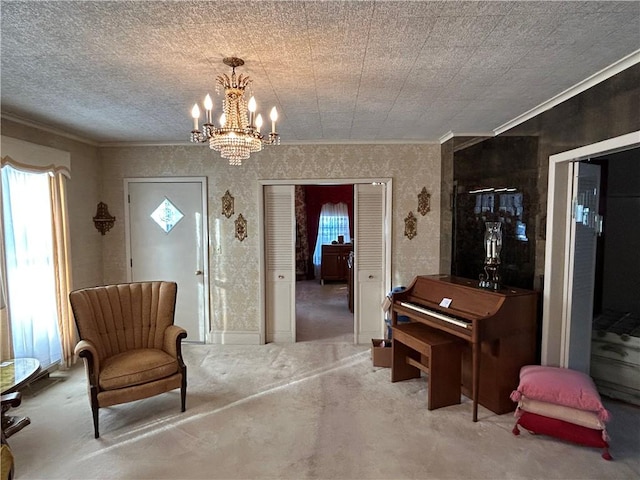 living area with ornamental molding, carpet flooring, and an inviting chandelier