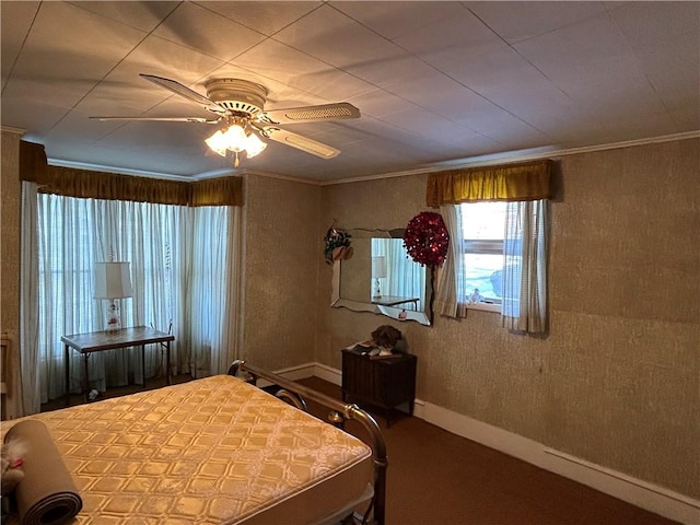 bedroom with crown molding and ceiling fan