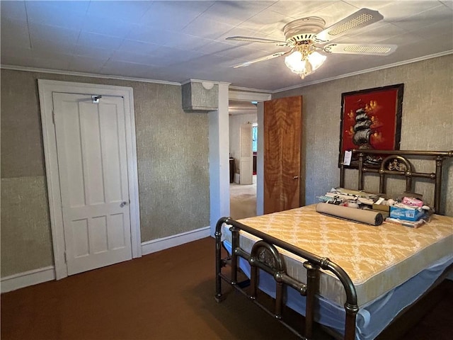 bedroom featuring crown molding and ceiling fan