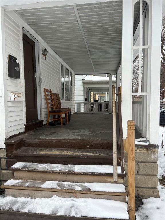 exterior space featuring covered porch