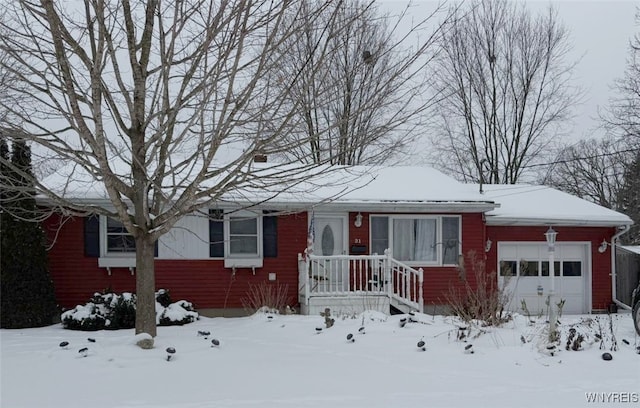 single story home featuring a garage