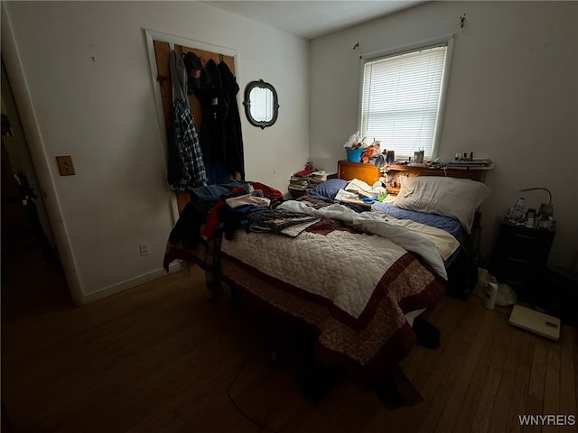 bedroom featuring hardwood / wood-style flooring