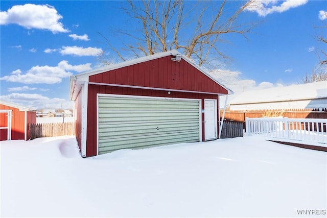 view of snow covered garage