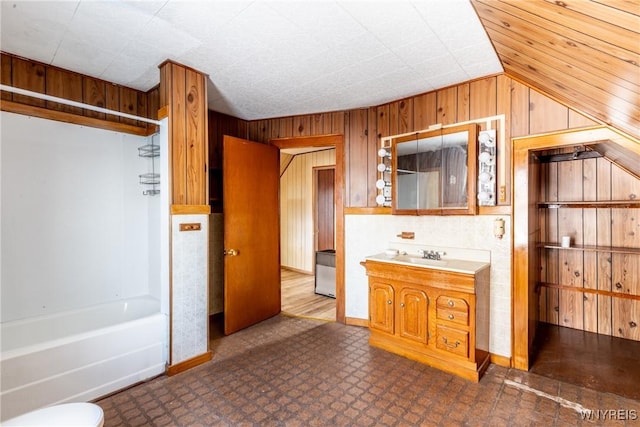 bathroom featuring vanity and tub / shower combination